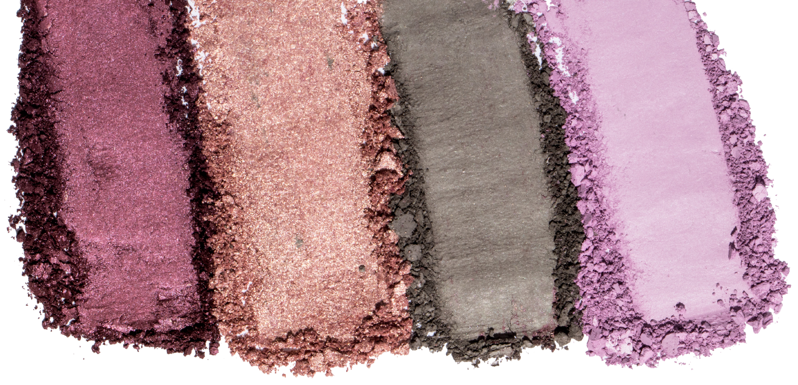 Crushed eyeshadow palette pigments in bold natural colors, symbolizing beauty industry toxins and ingredient awareness.