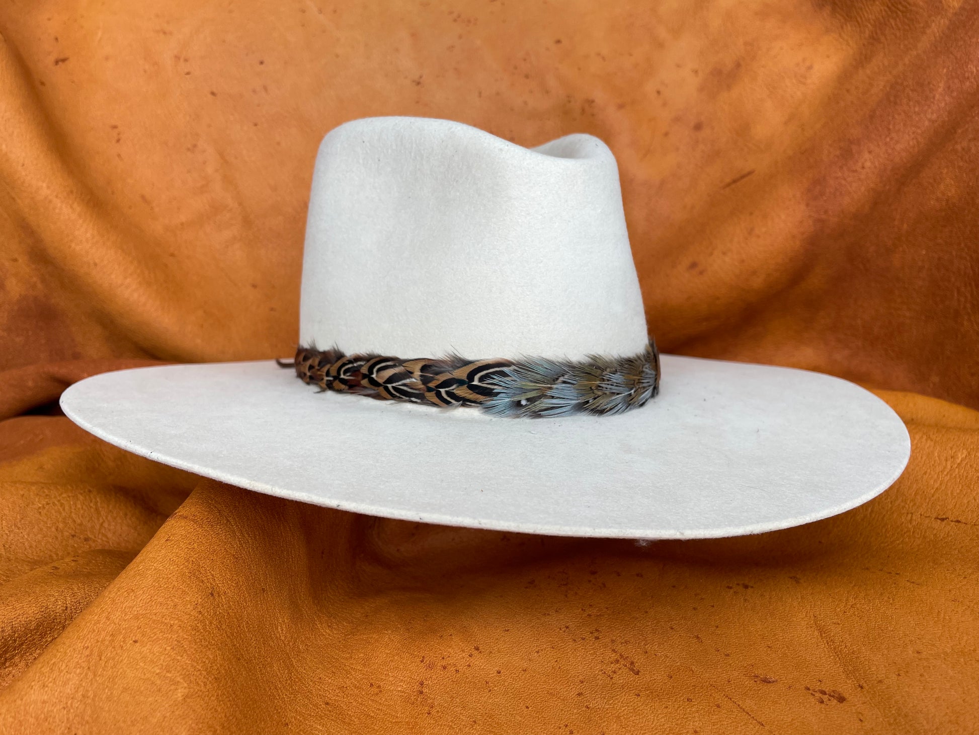 Natural jewel-tone feather hatband, front angle shot