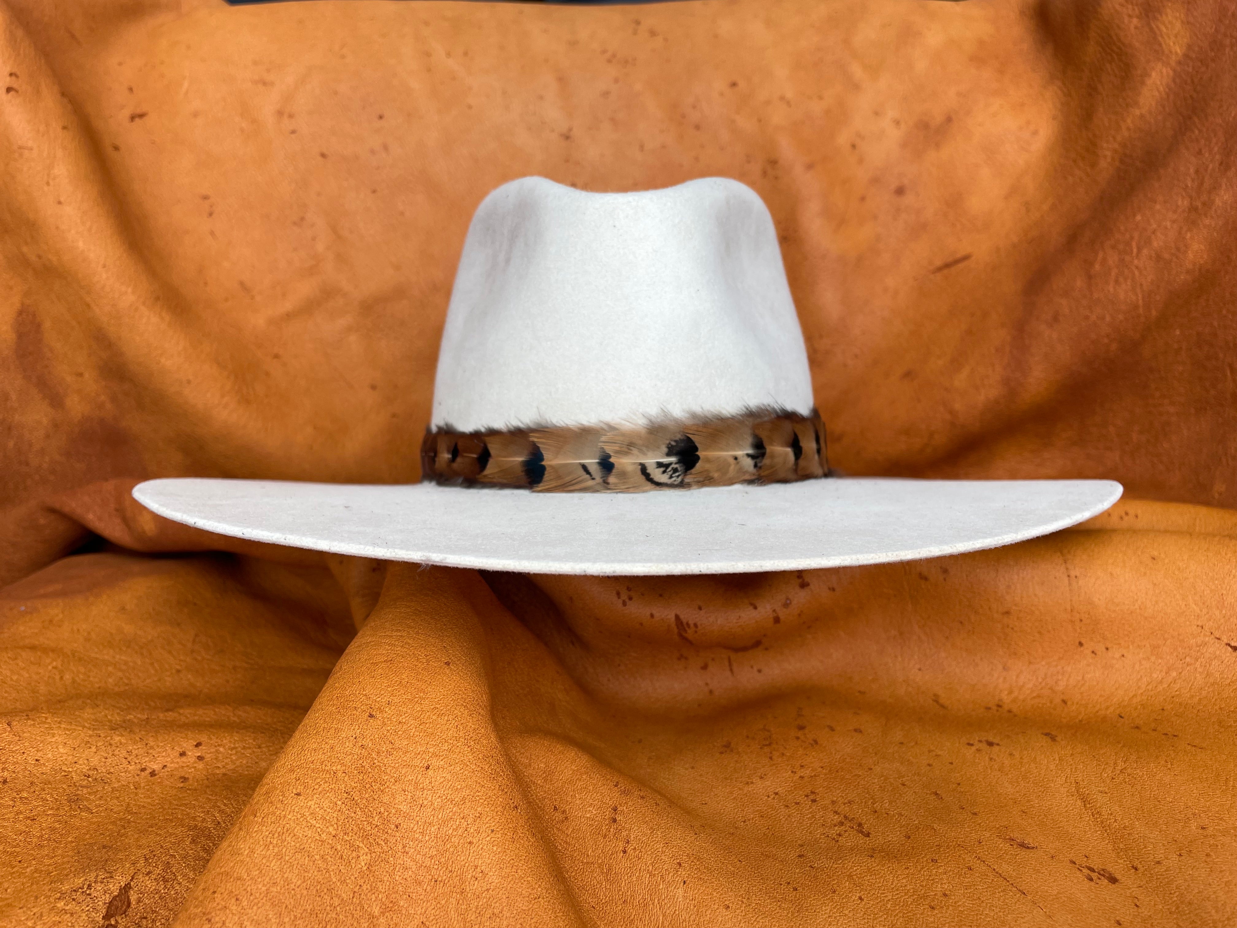 Elowen gradient maroon-to-gold feather hatband, front angle