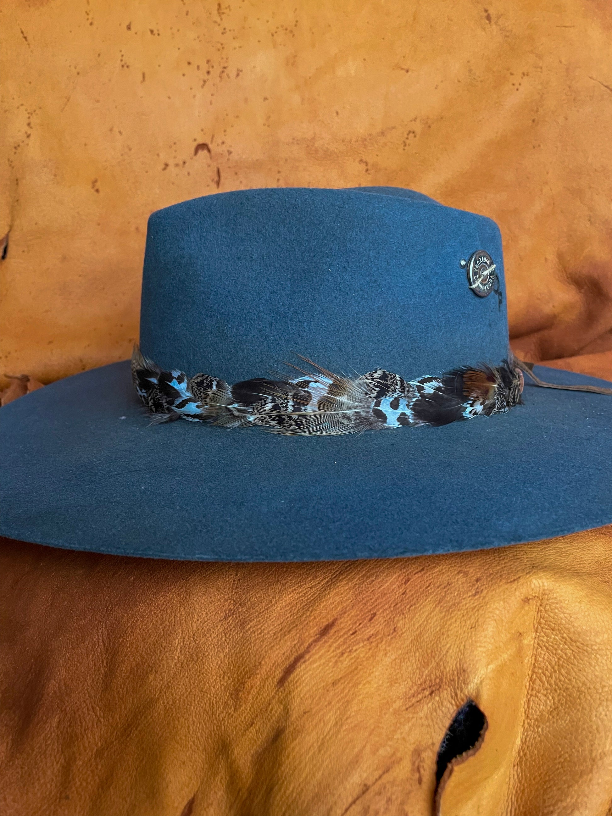 One-of-a-kind feather band inspired by natural landscapes