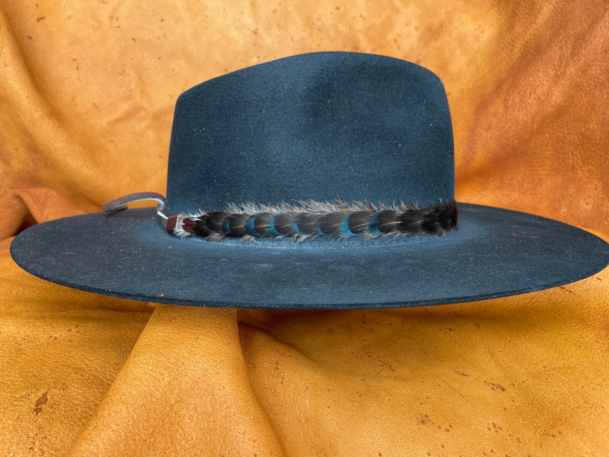 Moody western feather hatband detail