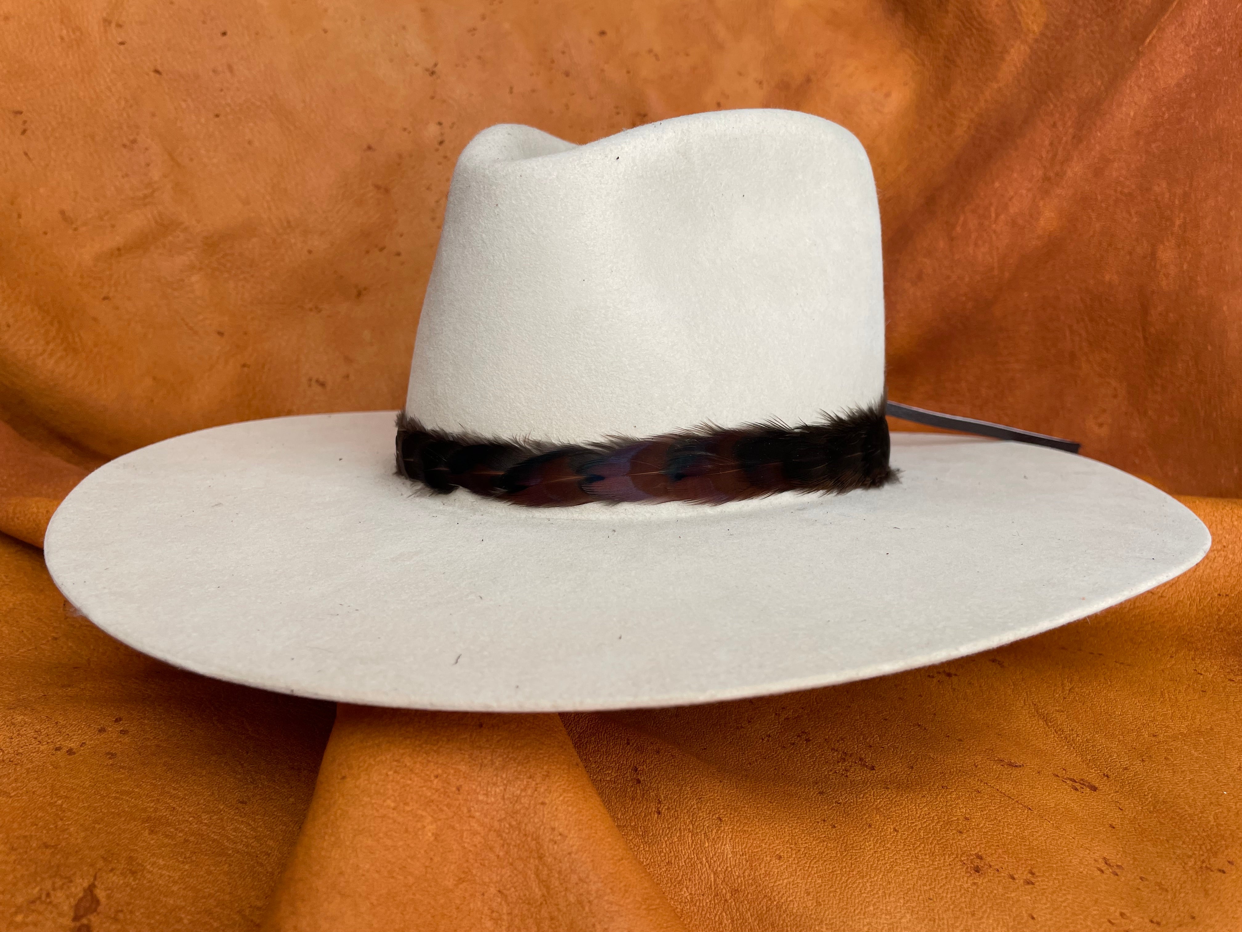 Rowan hatband on cream hat, front view